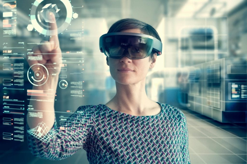 Image showing a woman using the Microsoft HoloLens